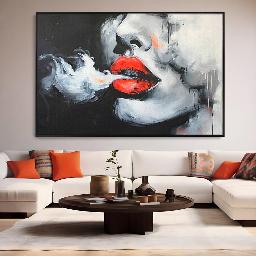 Tablou canvas cu tablou canvas cu buze rosii si fum, in rama de aluminiu negru, pe perete intr-un living